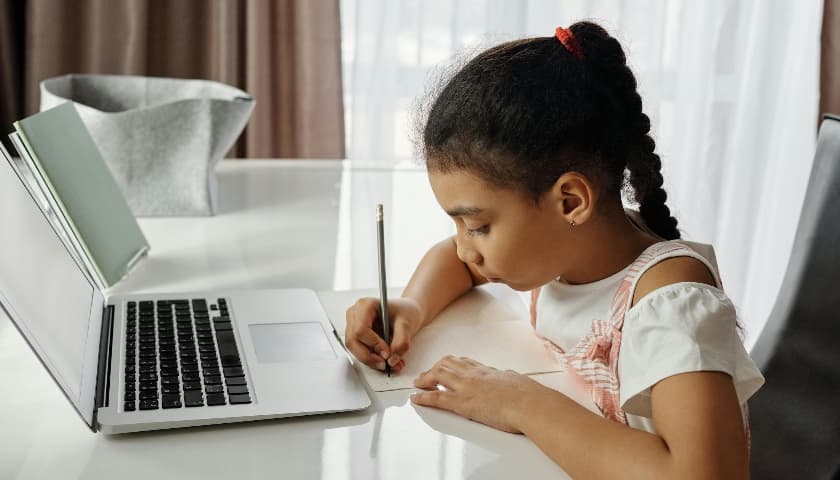 children with paper masks