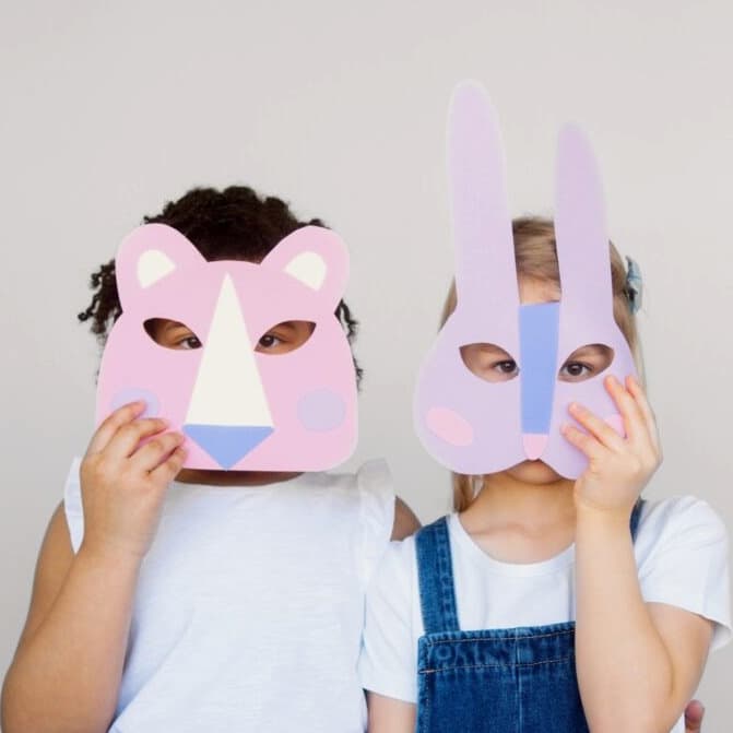 children with paper masks