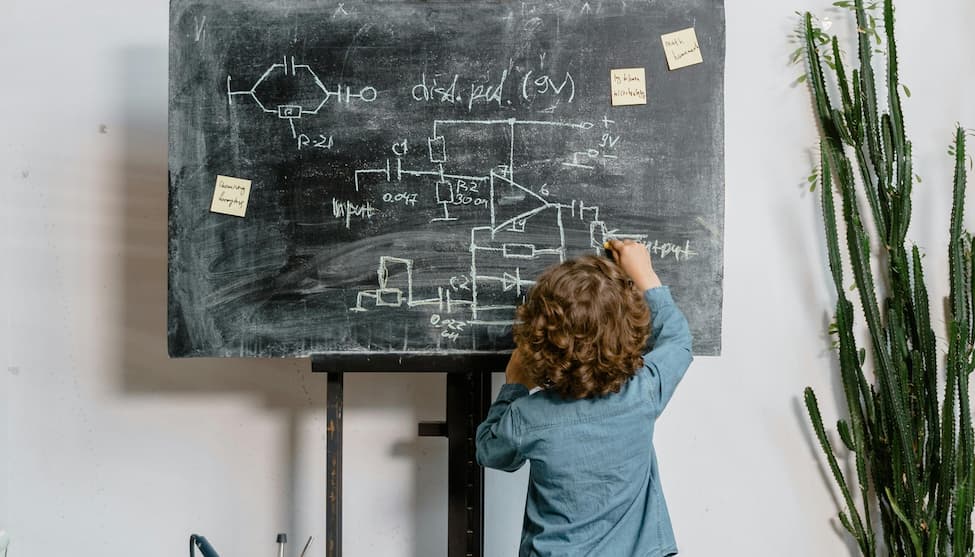 children with paper masks